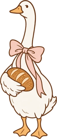 A cream goose with a pink ribbon holding a sourdough loaf